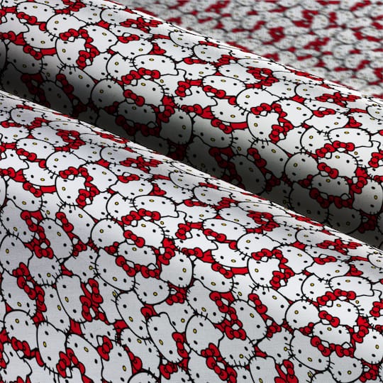 Hello Kitty® Packed Red Bow Cotton Fabric